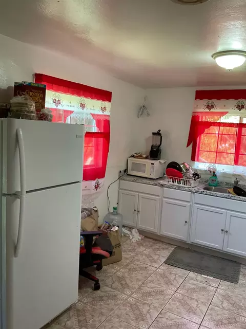 Kitchen - 303 Plainsburg Rd, Planada, CA 95365 photo 1 of 7