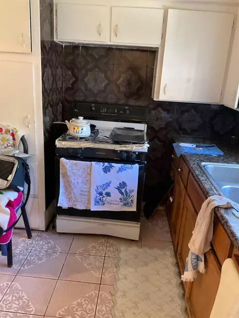 Kitchen - 303 Plainsburg Rd, Planada, CA 95365 photo 5 of 7
