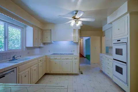 Kitchen - 705 Leytonstone Ave, Modesto, CA 95355 photo 3 of 4
