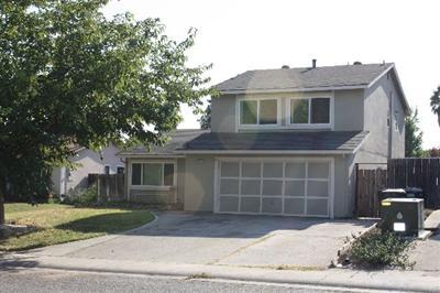 6909 Woodside Dr, Sacramento, CA 95842 photo 1