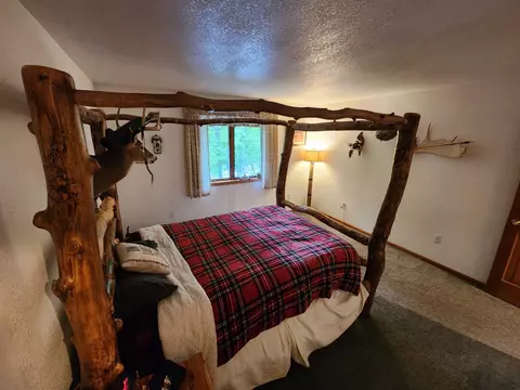Bedroom - 1919 Sunset Dr, Tomahawk, WI 54487 photo 5 of 10
