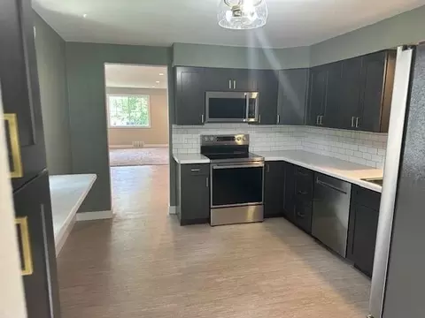 Kitchen - 111 S Cherry Ave, Marshfield, WI 54449 photo 2 of 2