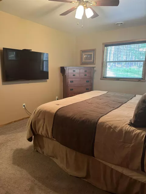 Bedroom - 10386 Forest Rd, Tomahawk, WI 54487 photo 2 of 4