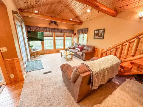 Living - n8633 East Wilson Flowage Road, Phillips, WI 54555 photo 1 of 6