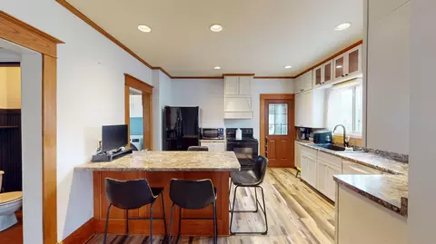Kitchen - 301 E 2nd St, Marshfield, WI 54449 photo 1 of 6