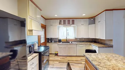 Kitchen - 301 E 2nd St, Marshfield, WI 54449 photo 5 of 6