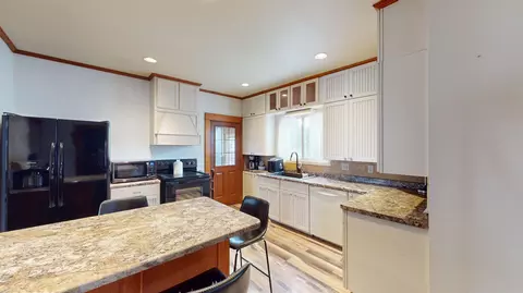 Kitchen - 301 E 2nd St, Marshfield, WI 54449 photo 2 of 6