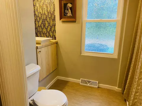 Bath - 140 Jackson St, Iola, WI 54945 photo 1 of 2