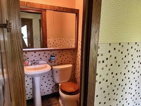 Bath - 113 S Cherry Ave, Marshfield, WI 54449 photo 1 of 2