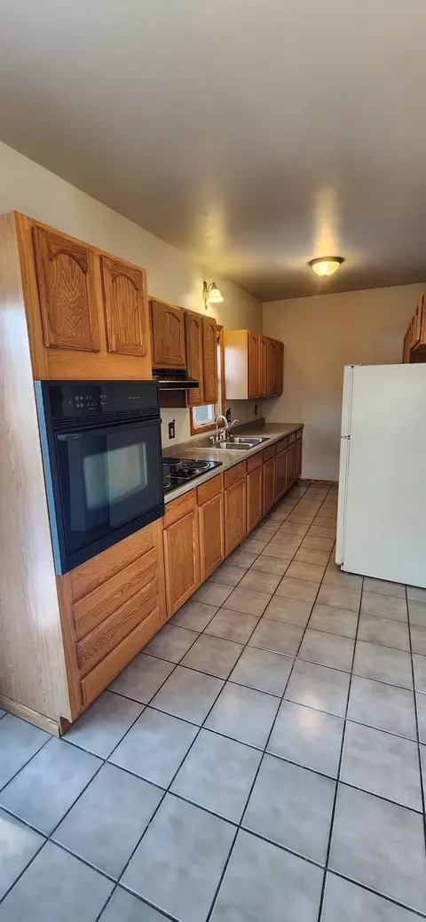 Kitchen - 1007 E Fourth St, Merrill, WI 54452 photo 1 of 2
