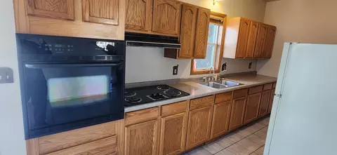 Kitchen - 1007 E Fourth St, Merrill, WI 54452 photo 2 of 2