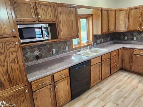 Kitchen - 385 120th St, Corwith, IA 50430 photo 2 of 3