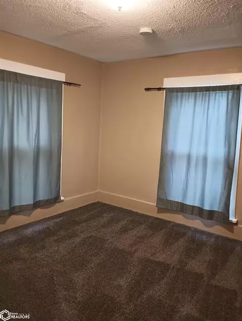 Bedroom - 403 1st St NW, Hampton, IA 50441 photo 2 of 3
