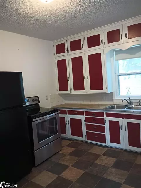 Kitchen - 403 1st St NW, Hampton, IA 50441 photo 2 of 2