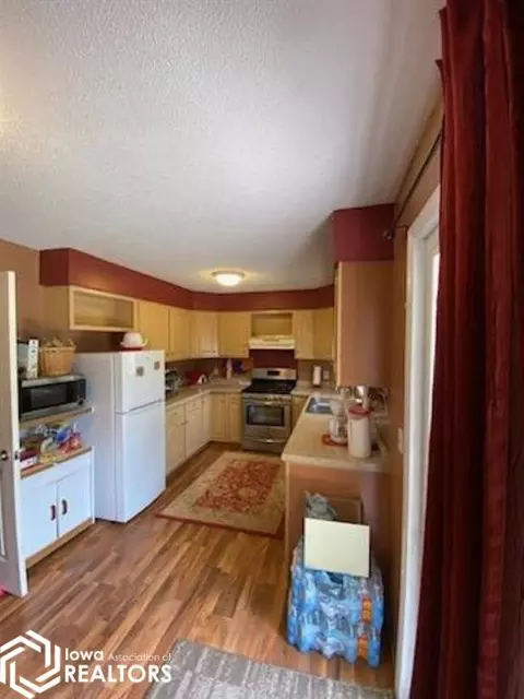 Kitchen - 1230 State St, Garner, IA 50438 photo 2 of 2