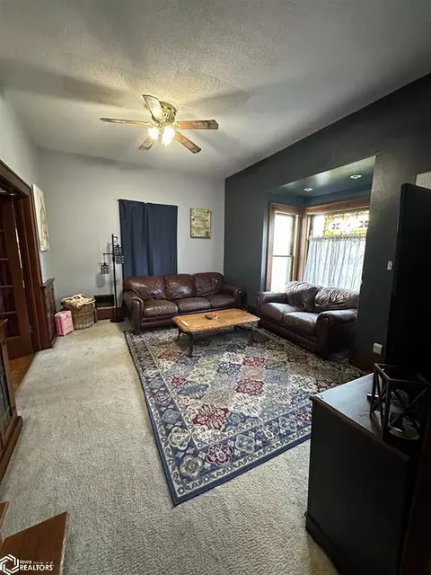Living - 1007 7th St, Corning, IA 50841 photo 2 of 2