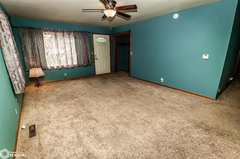 Living - 306 N Dwight St, Conrad, IA 50621 photo 2 of 3
