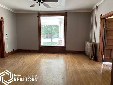Living - 107 E Washington St, Centerville, IA 52544 photo 2 of 4