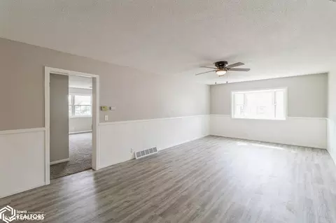 Living - 390 E 6th St, Garner, IA 50438 photo 2 of 3