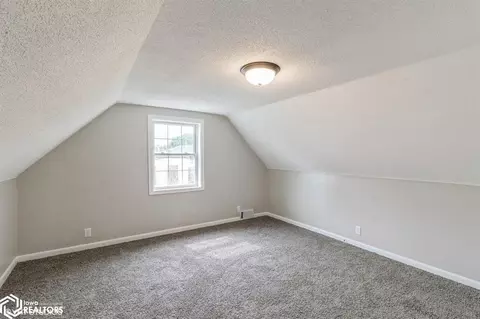 Bedroom - 390 E 6th St, Garner, IA 50438 photo 3 of 4
