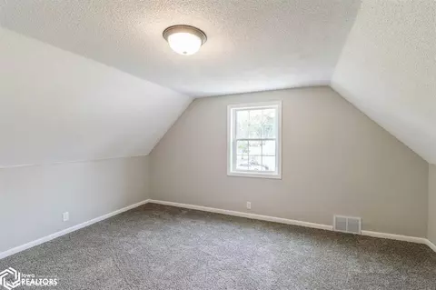 Bedroom - 390 E 6th St, Garner, IA 50438 photo 2 of 4