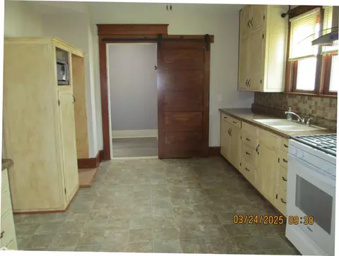 Kitchen - 207 E 5th St, Atlantic, IA 50022 photo 3 of 4