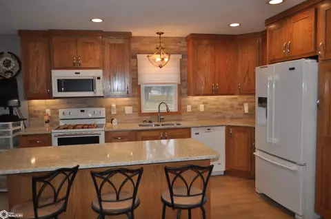 Kitchen - 411 W 2nd St, Glidden, IA 51443 photo 5 of 10