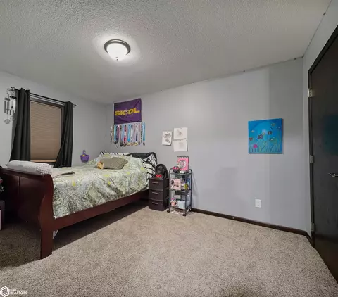 Bedroom - 216 Oak Hill Dr, Hampton, IA 50441 photo 10 of 14