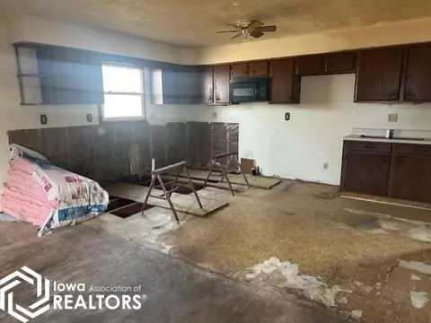 Kitchen - 506 1st St, Corwith, IA 50430 photo 2 of 3