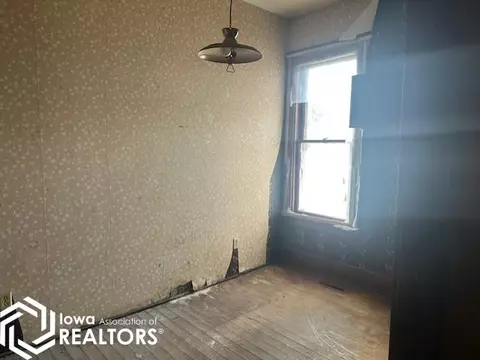 Bedroom - 506 1st St, Corwith, IA 50430 photo 2 of 4