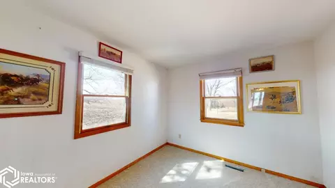 Bedroom - 49700 20th Ave, Rake, IA 50465 photo 1 of 5