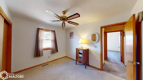 Bedroom - 49700 20th Ave, Rake, IA 50465 photo 2 of 5