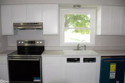 Kitchen - 318 E 3rd St, Carroll, IA 51401 photo 2 of 3