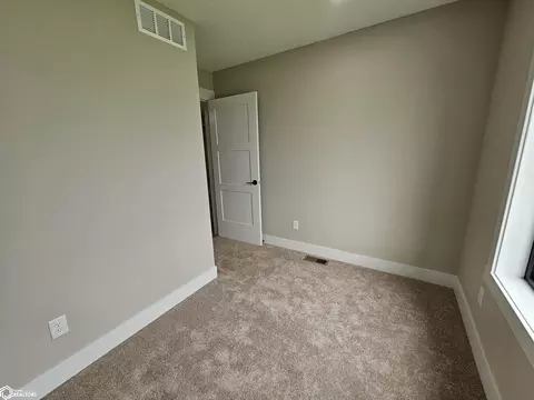 Bedroom - 1407 E 10th St, Carroll, IA 51401 photo 2 of 9