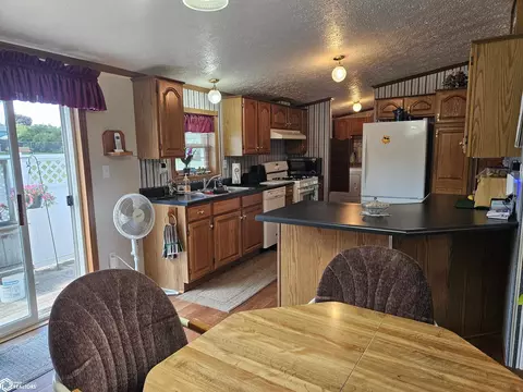 Kitchen - 428 E 8th St, Glidden, IA 51443 photo 1 of 3