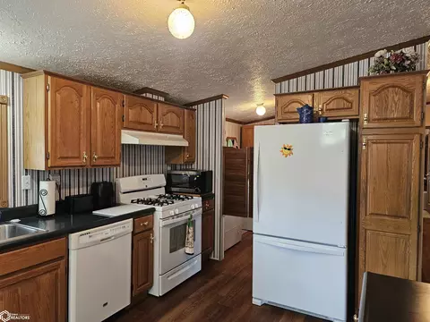 Kitchen - 428 E 8th St, Glidden, IA 51443 photo 2 of 3