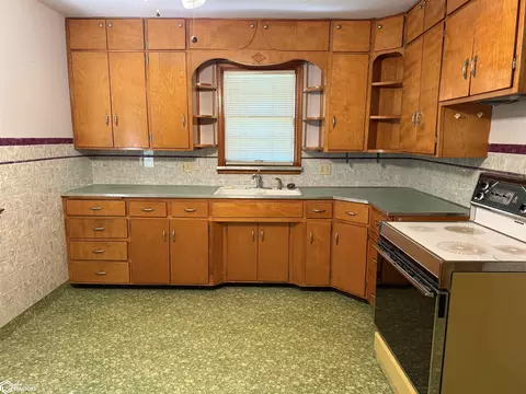 Kitchen - 415 3rd Ave, Dedham, IA 51440 photo 2 of 3