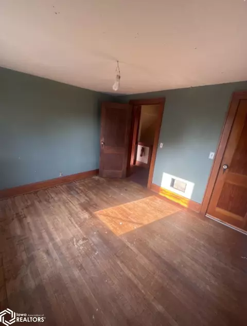 Bedroom - 390 E Patrick St, Dougherty, IA 50433 photo 5 of 7