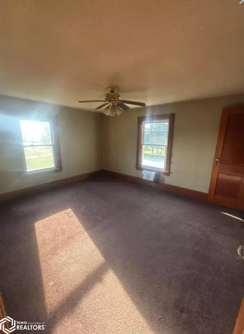 Bedroom - 390 E Patrick St, Dougherty, IA 50433 photo 2 of 7