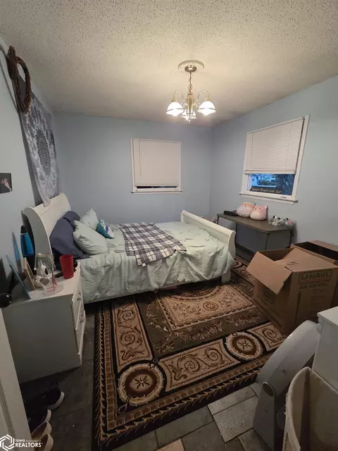 Bedroom - 107 N Eugene St N, Orient, IA 50858 photo 2 of 2