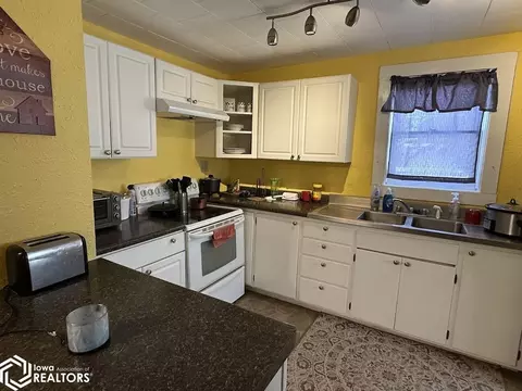 Kitchen - 409 3rd St NW, Hampton, IA 50441 photo 1 of 4