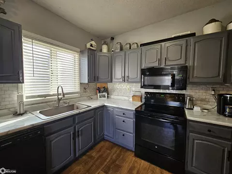 Kitchen - 429 E 3rd St, Glidden, IA 51443 photo 3 of 4