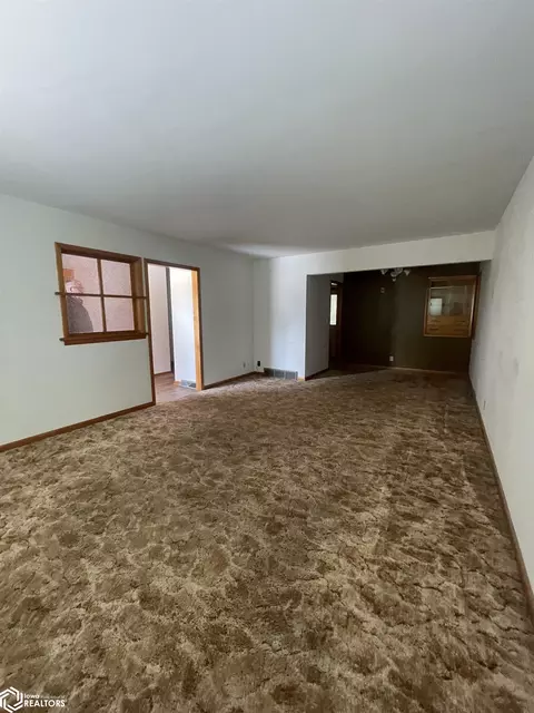 Living - 110 E 10th St, Carroll, IA 51401 photo 2 of 2