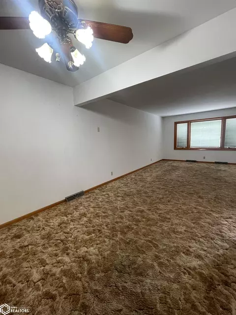 Living - 110 E 10th St, Carroll, IA 51401 photo 1 of 2