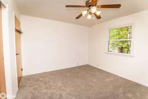 Bedroom - 506 E Maple Ave, Conrad, IA 50621 photo 4 of 11