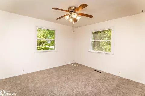 Bedroom - 506 E Maple Ave, Conrad, IA 50621 photo 3 of 11