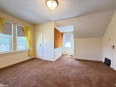 Bedroom - 207 3rd St SE, Hampton, IA 50441 photo 5 of 14