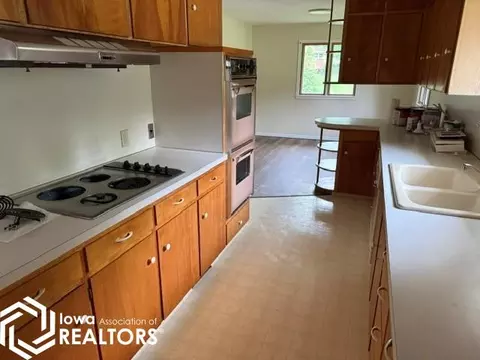 Kitchen - 312 E Overmeyer Dr, Algona, IA 50511 photo 1 of 2
