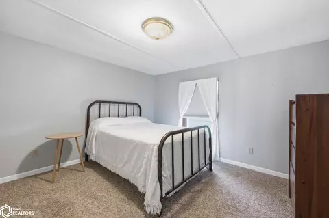 Bedroom - 409 E Jaycee St, Avoca, IA 51521 photo 2 of 5