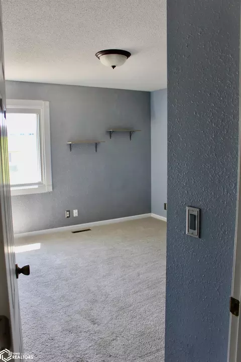 Bedroom - 1406 E 17th St, Atlantic, IA 50022 photo 2 of 6